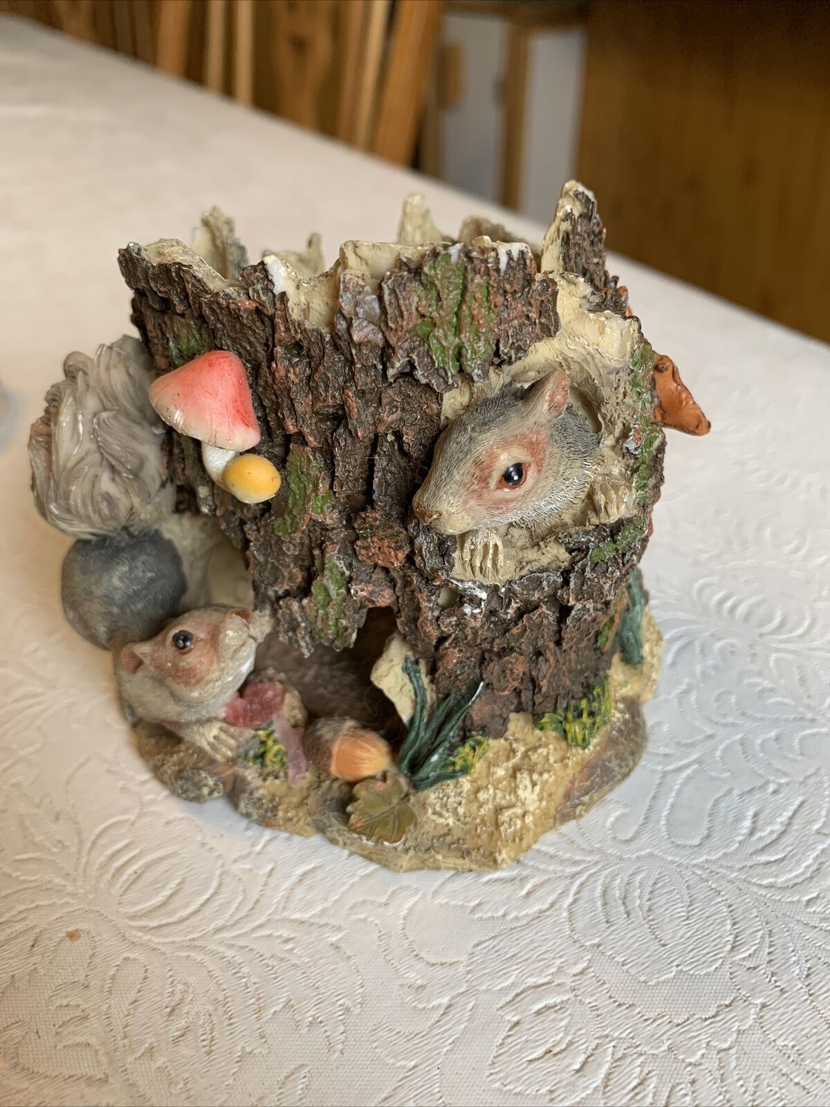 Cute Figurine Squirrels in a Stump