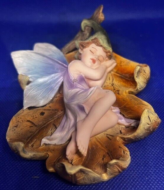 Vintage Baby Fairy Sleeping On Maple Leaf Figurine