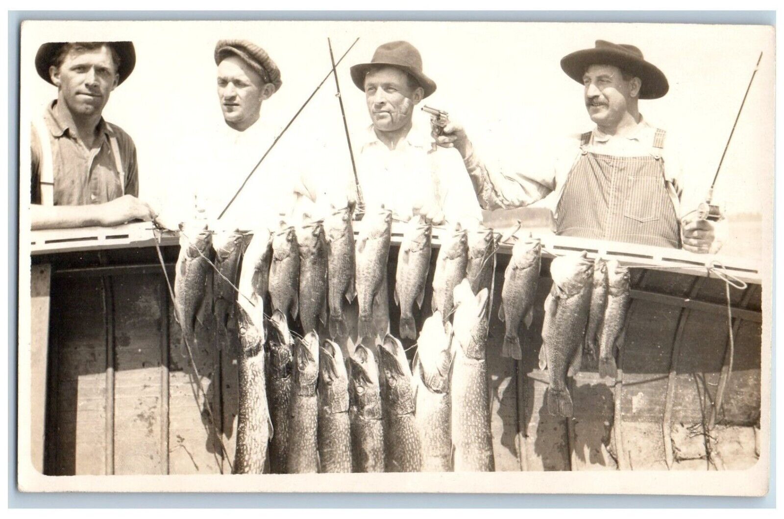 Fishing Mysterious Postcard RPPC Photo Man With Gun Pistol Weird Fishes c1910's