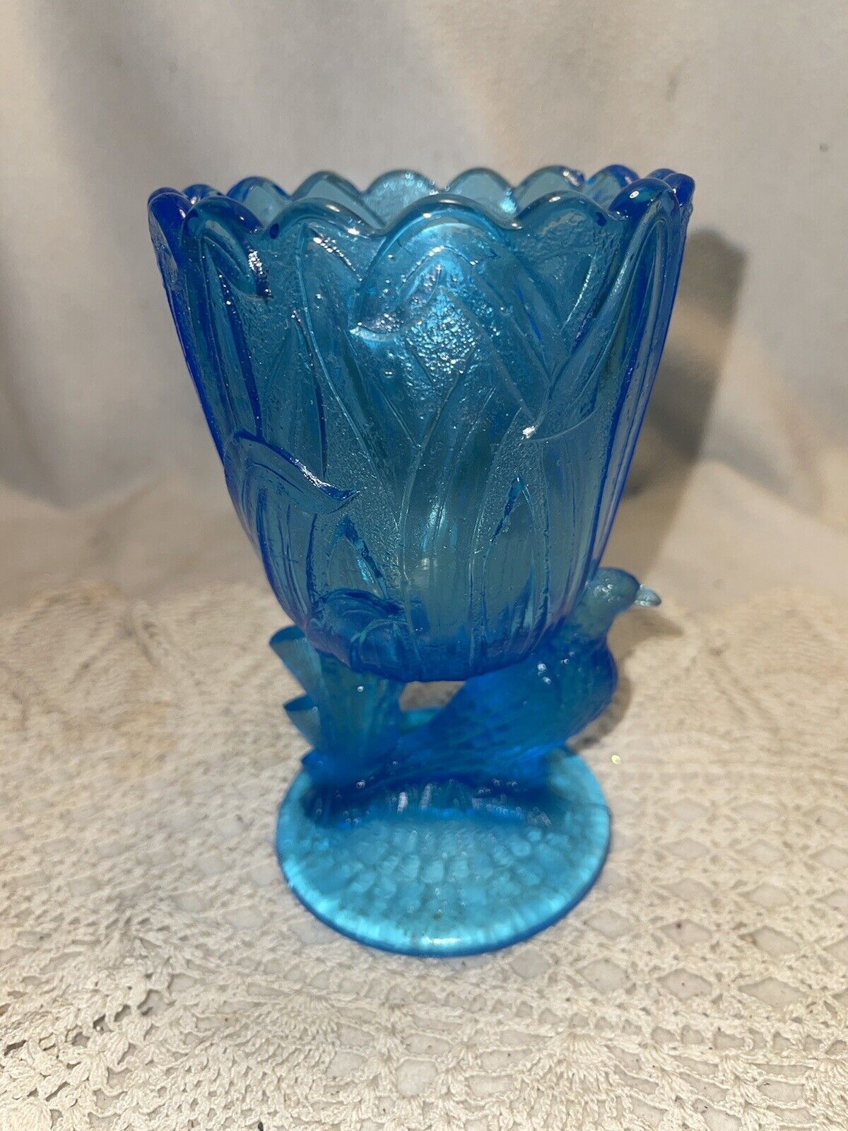 Vintage Aqua blue Spooner glass vase with Raven pedestal.