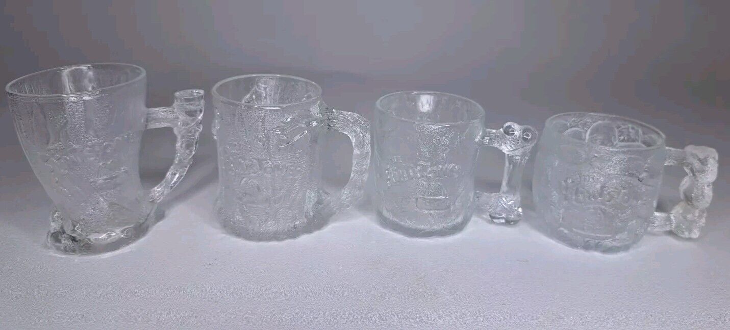 Complete set of 4  1993 McDonalds Flintstones Glass Mug RocDonalds