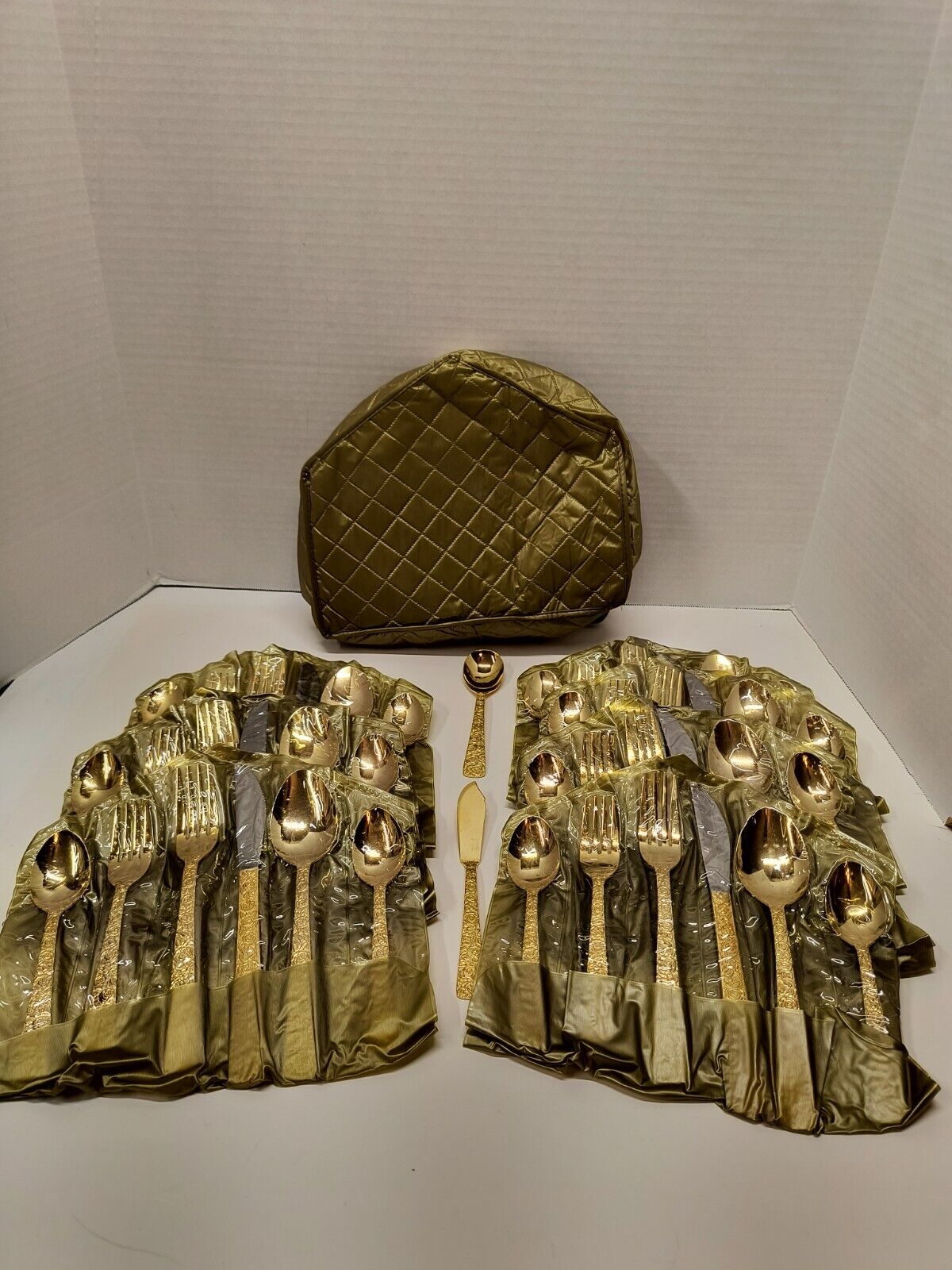 Cellini Romanesque gold plated flatware set for 7