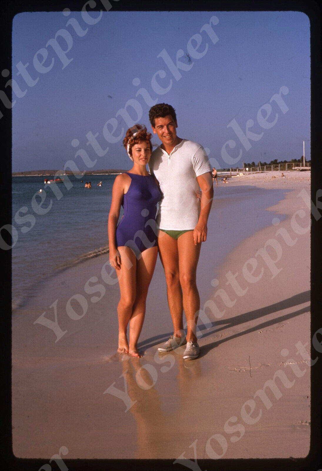 sl74 Original slide  1984 Sunning young  couple  / beach 105a