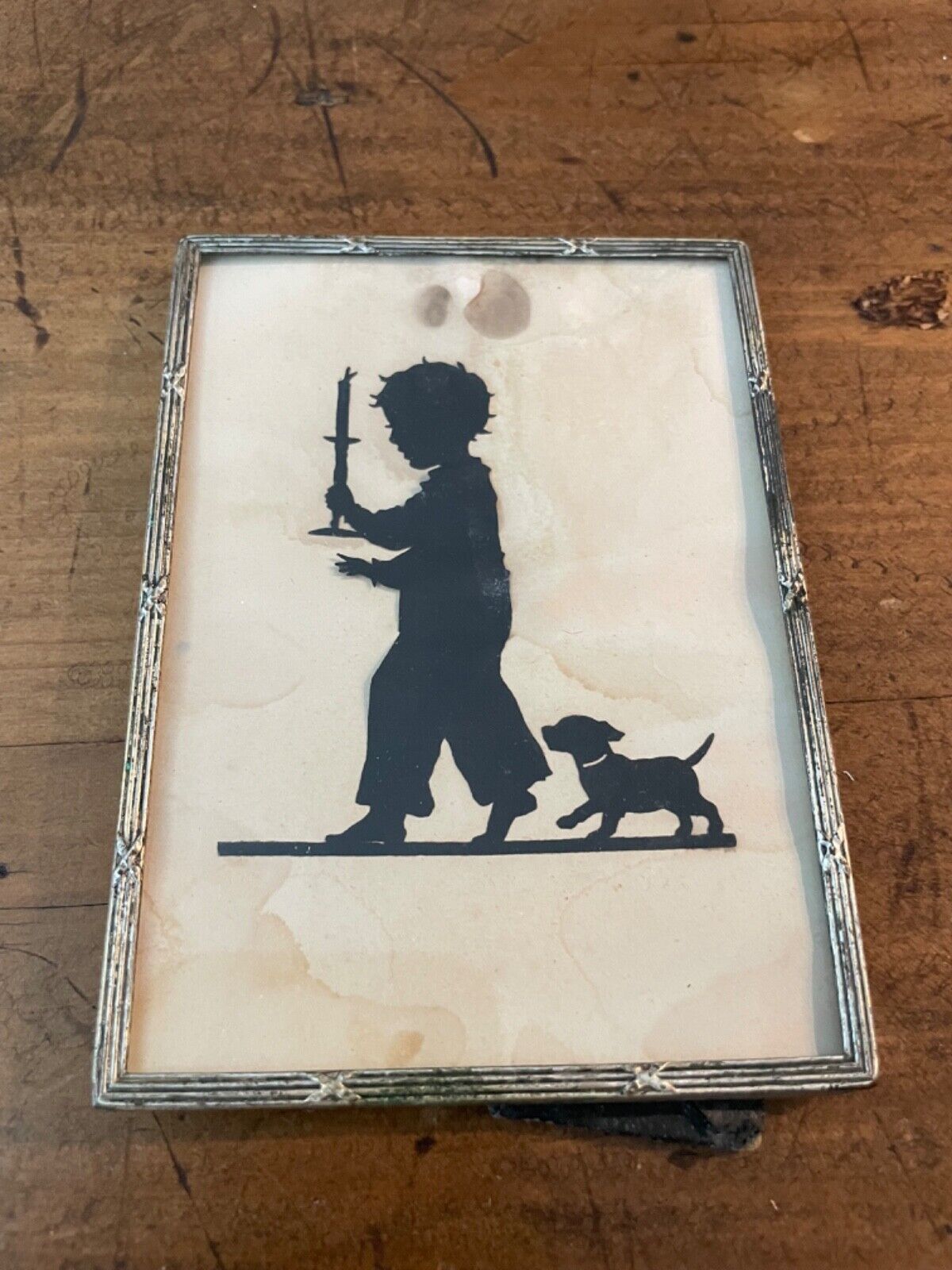 Vintage Silhouette of a Boy with a Dog