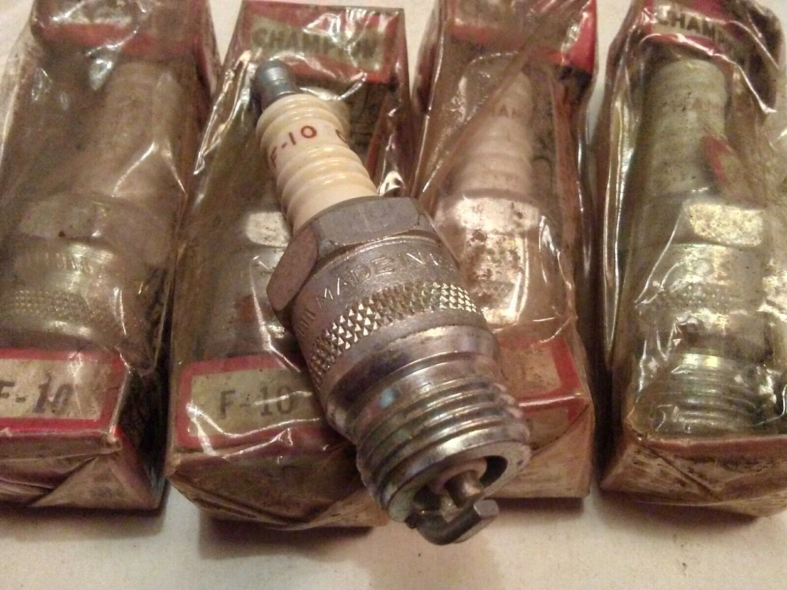 VTG NOS CHAMPION SPARK PLUGS F10 Qty. 5. PLUS 1 FREE USED ONE MADE IN USA 