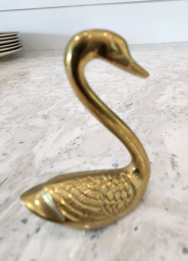 Vintage Solid brass swan with intricate carved wing detail