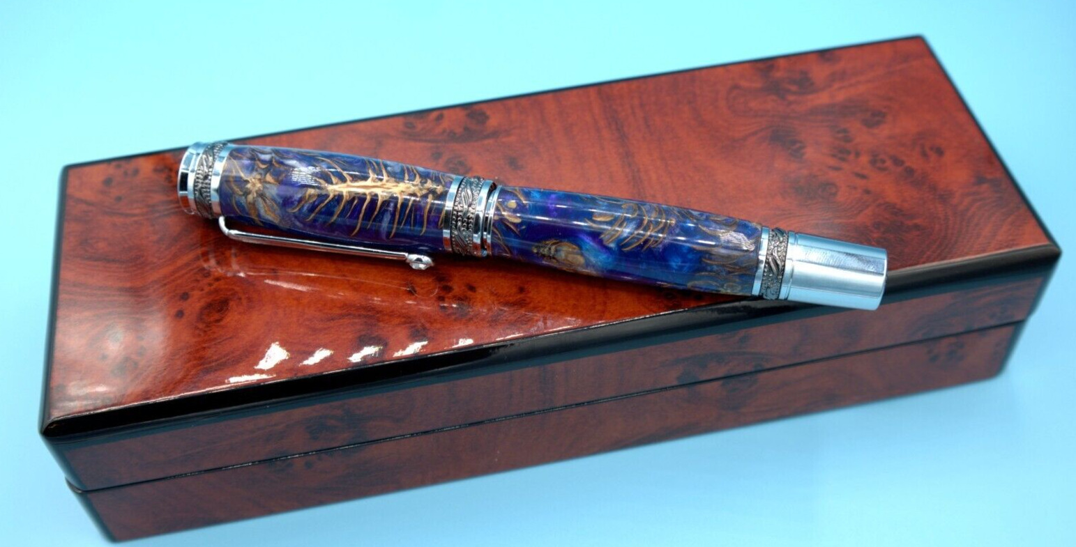 Blue Majestic Rollerball Pen in Chrome & Gun Metal Embedded Pine Cones in Resin