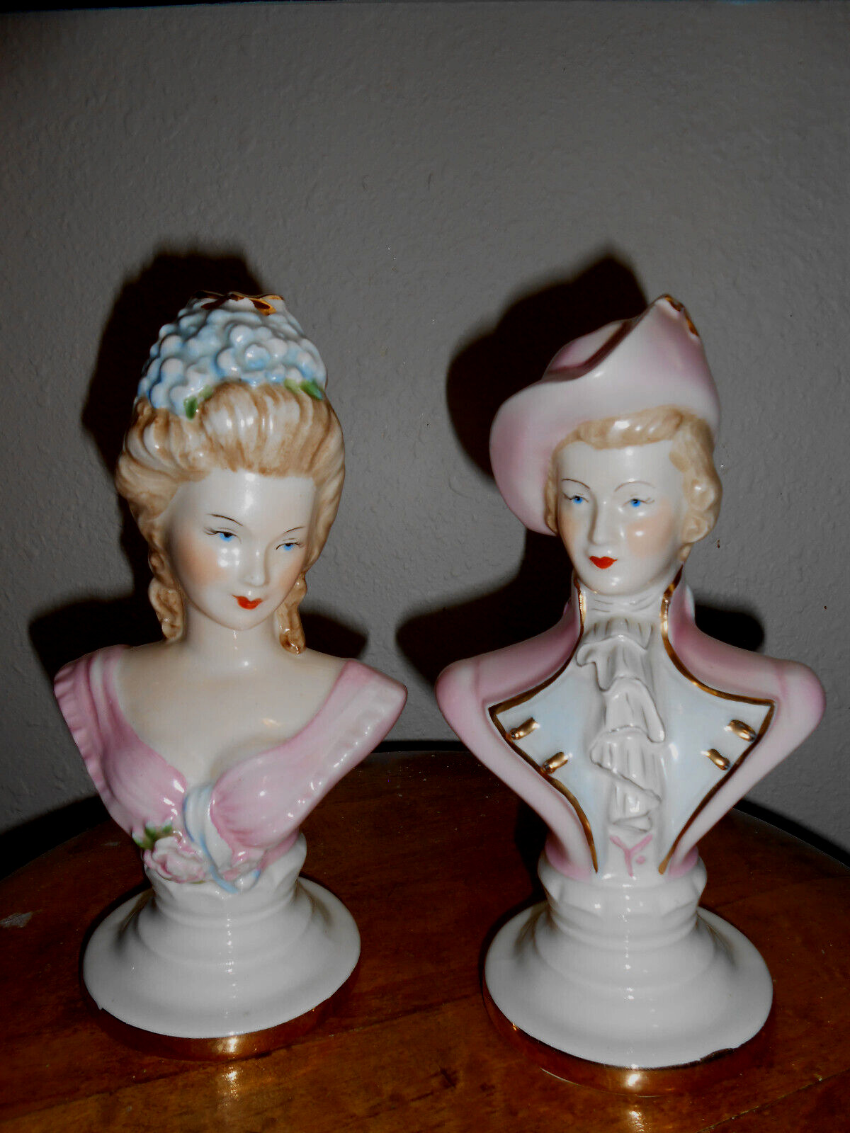 Pair of antique victorian porclain busts, hand painted, stamped and numbered