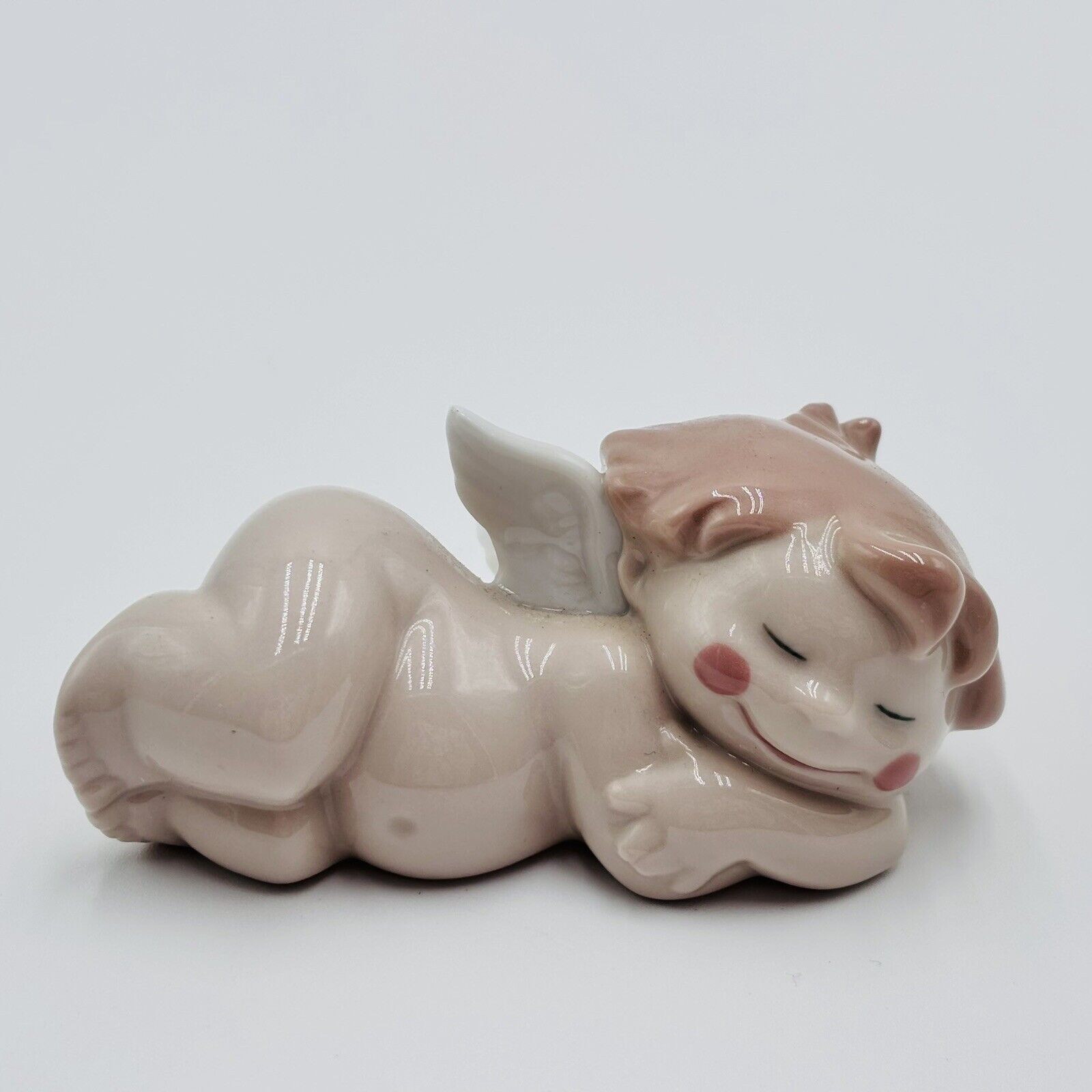 NAO by Lladro 2003 Cheeky Cherub Angel Figurine ‘Forty Winks’ Napping 5001 Spain