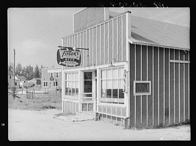 Photo:Beer parlor and barber shop. Craigville, Minnesota