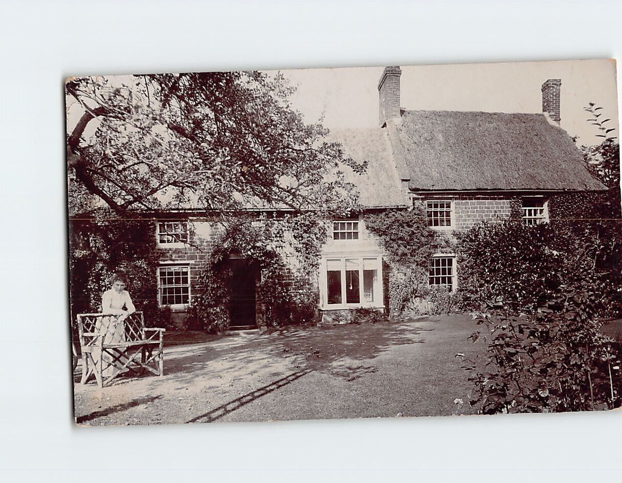 Postcard Woman in Front of a House