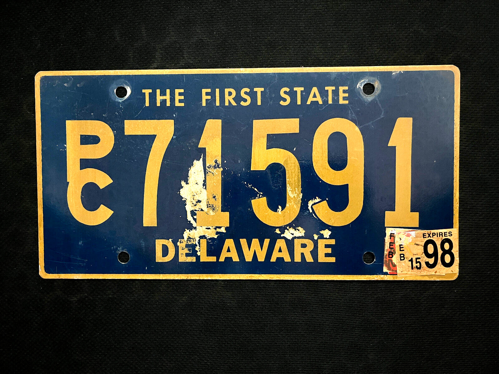 1998 Delaware License Plate PC71591   THE FIRST STATE, BEAUTIFUL YELLOW ON BLUE