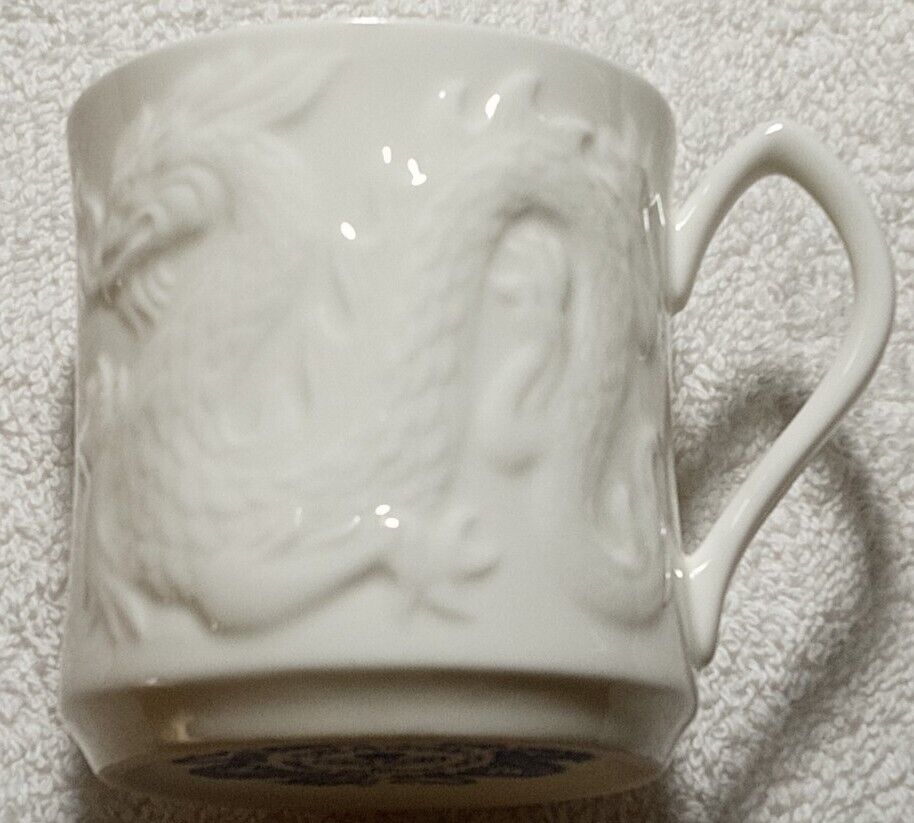 Coalport DRAGON White Embossed Cup by Donald Brindley