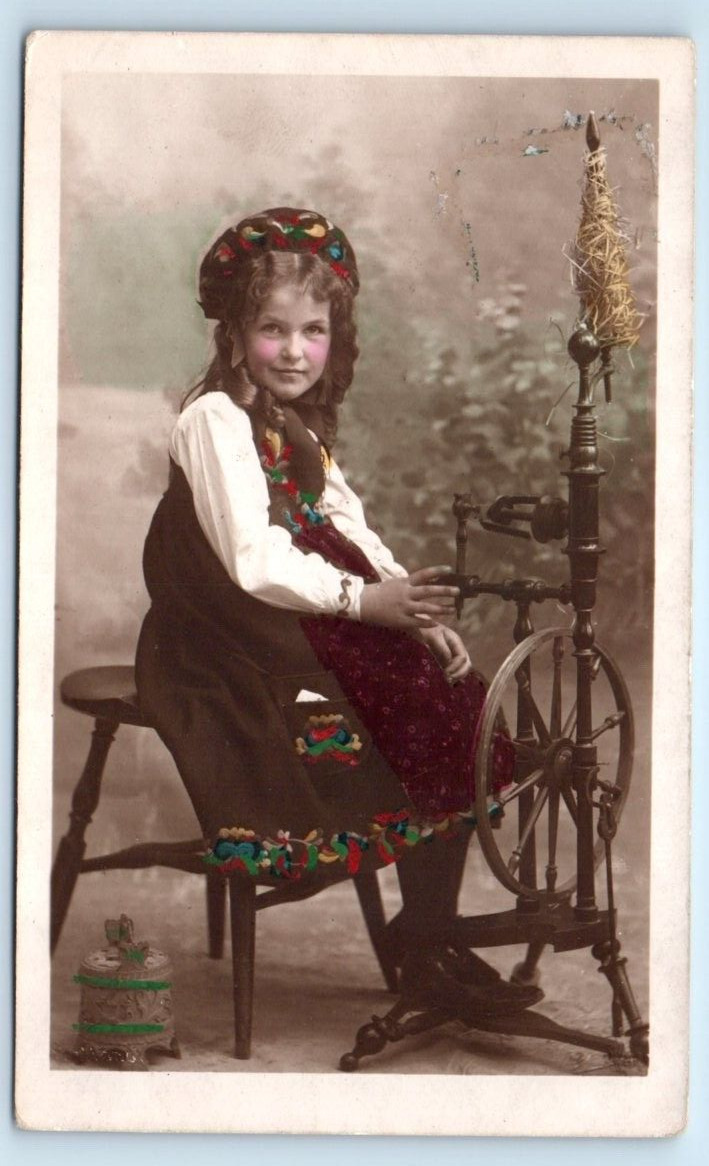 RPPC tinted little girl traditional Bunad dress weaving spinning NORWAY Postcard