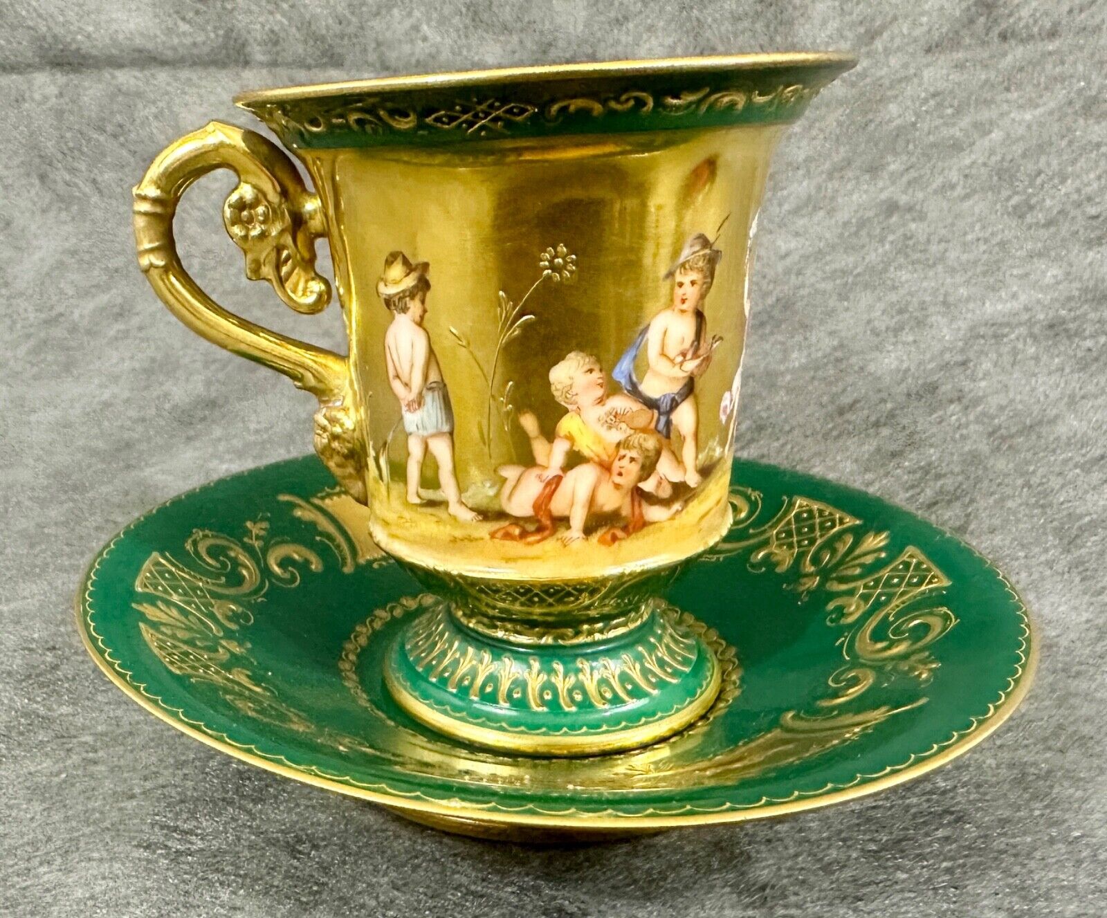 Austrian Royal Vienna (Style?) Green Porcelain Gold Gilt Cup & Saucer Cherubs