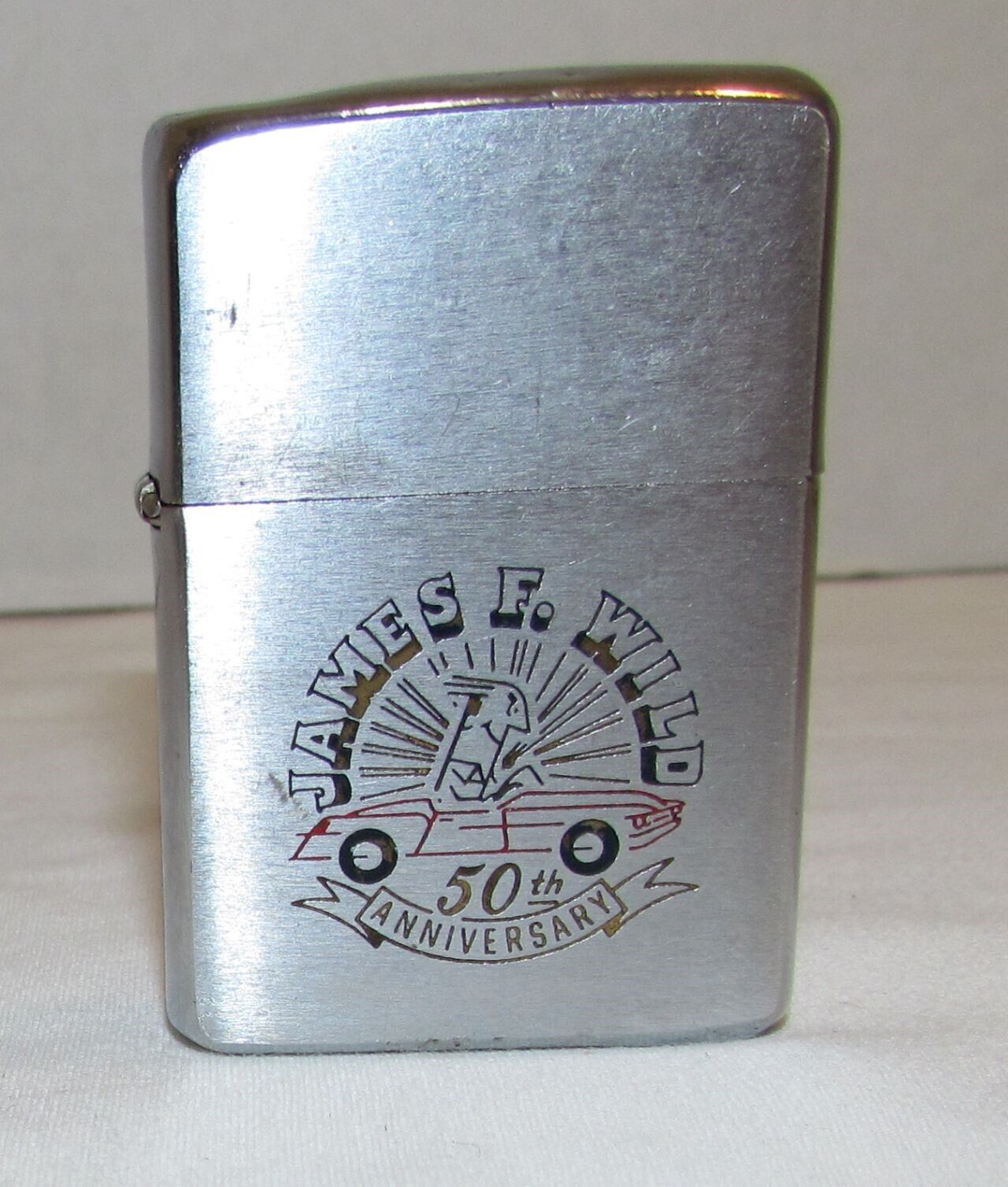 1961 Zippo Lighter: James F. Wild Auto Parts