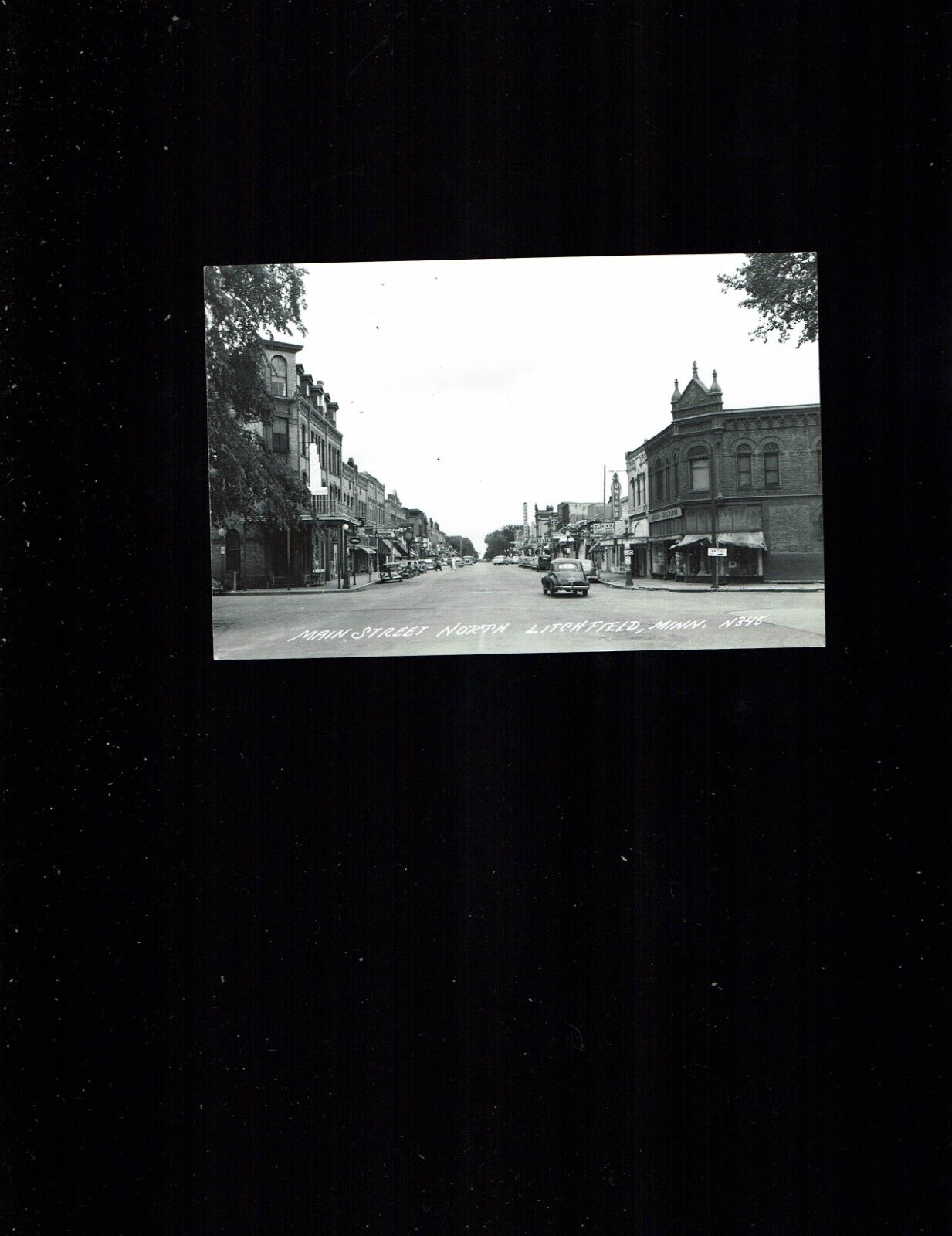 RPPC Litchfield, MN Minnesota Main Street north, not used, ca 1940\'s cars