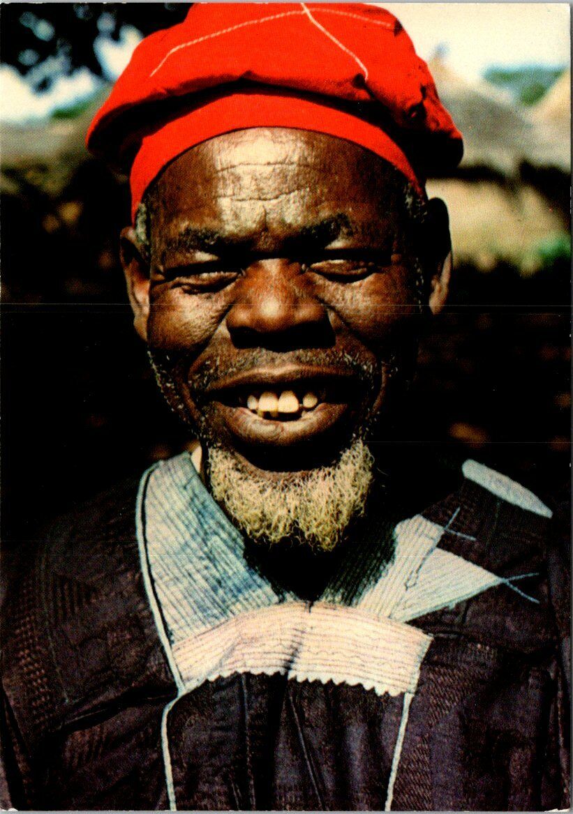 VINTAGE CONTINENTAL SIZE POSTCARD SMILING MAN (KENYA) LOADED ETHIOPIA STAMPS