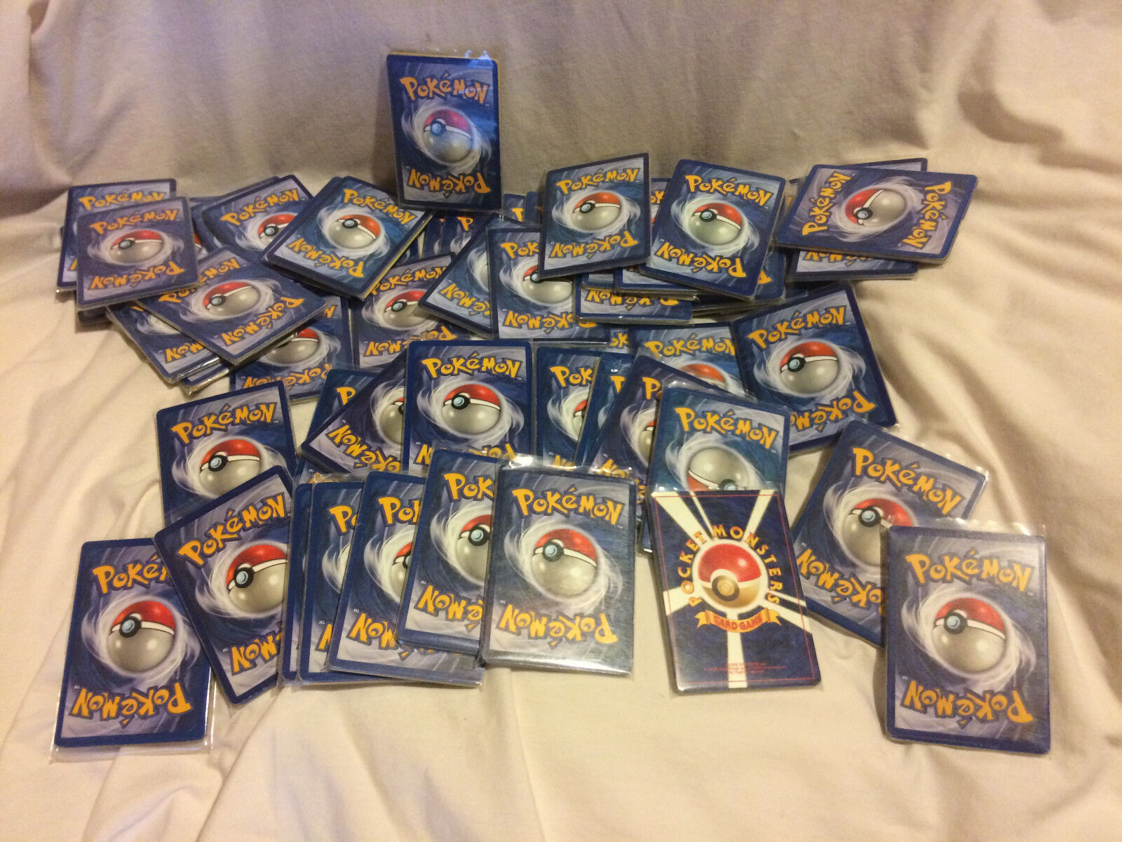 12 Pokemon Card Booster Pack Reverse or Holo Foil in every Repack
