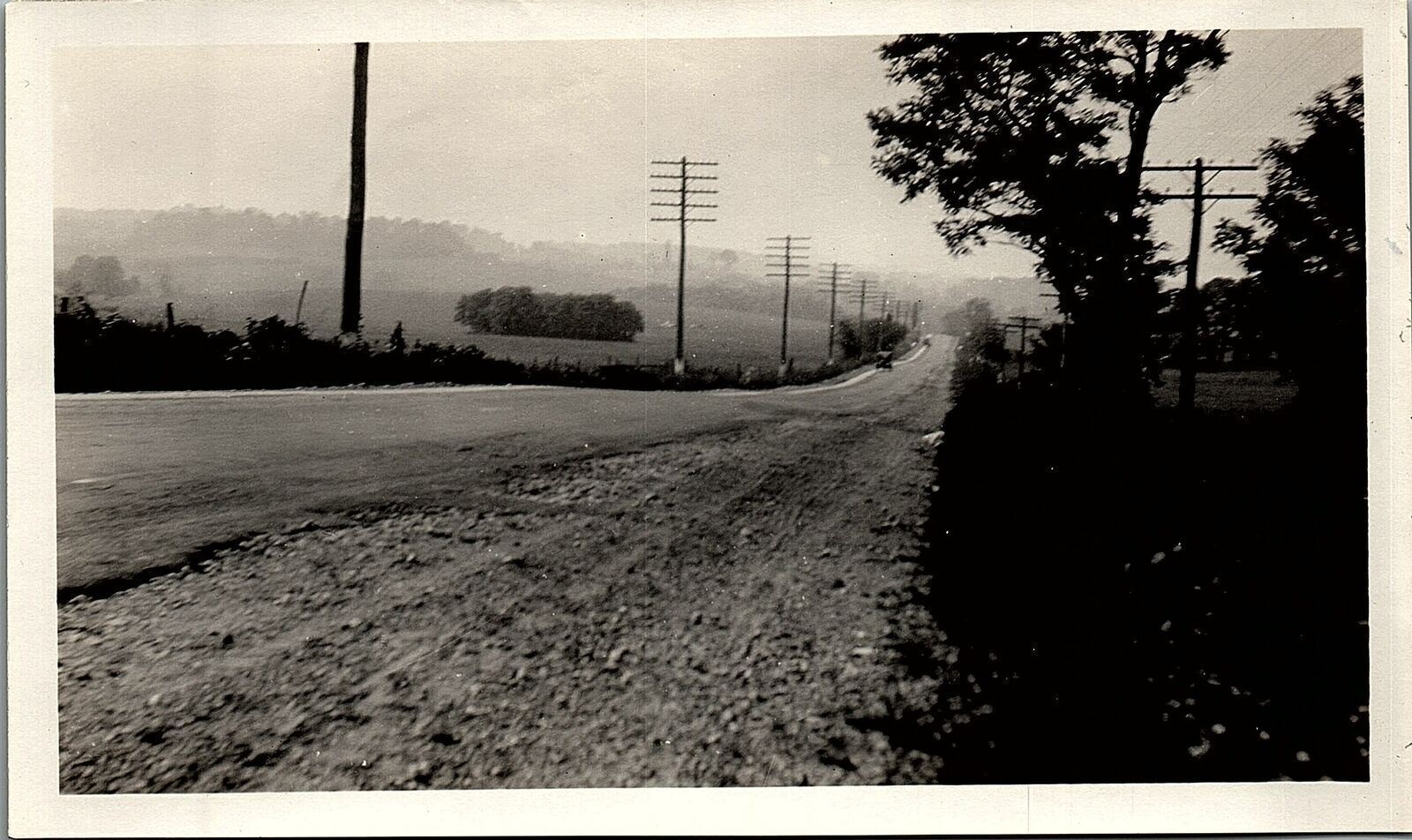 c1930 RURAL EARLY PAVED ROAD POWER POLES AUTOMOBILES  REAL PHOTOGRAPH 34-34