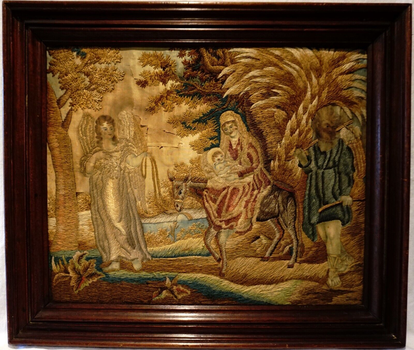 EARLY 19TH CENTURY NEEDLEWORK OF THE HOLY FAMILY\'S FLIGHT INTO EGYPT - c.1830