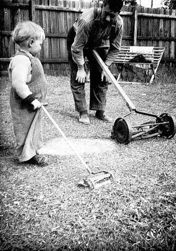 Greensborough Victoria Sep 1956 - A father and son in a backyard. - Old Photo