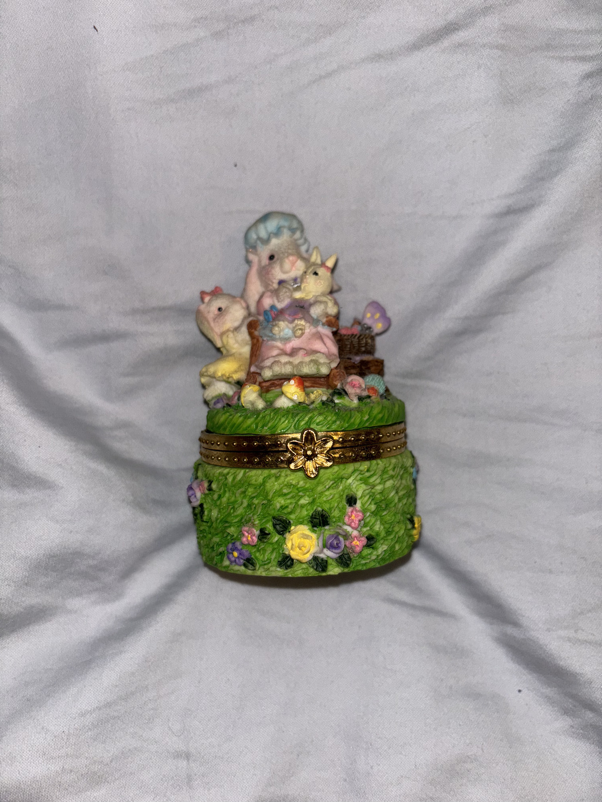 Vintage porcelain trinket box with momma bunny sewing an animal for her daughter