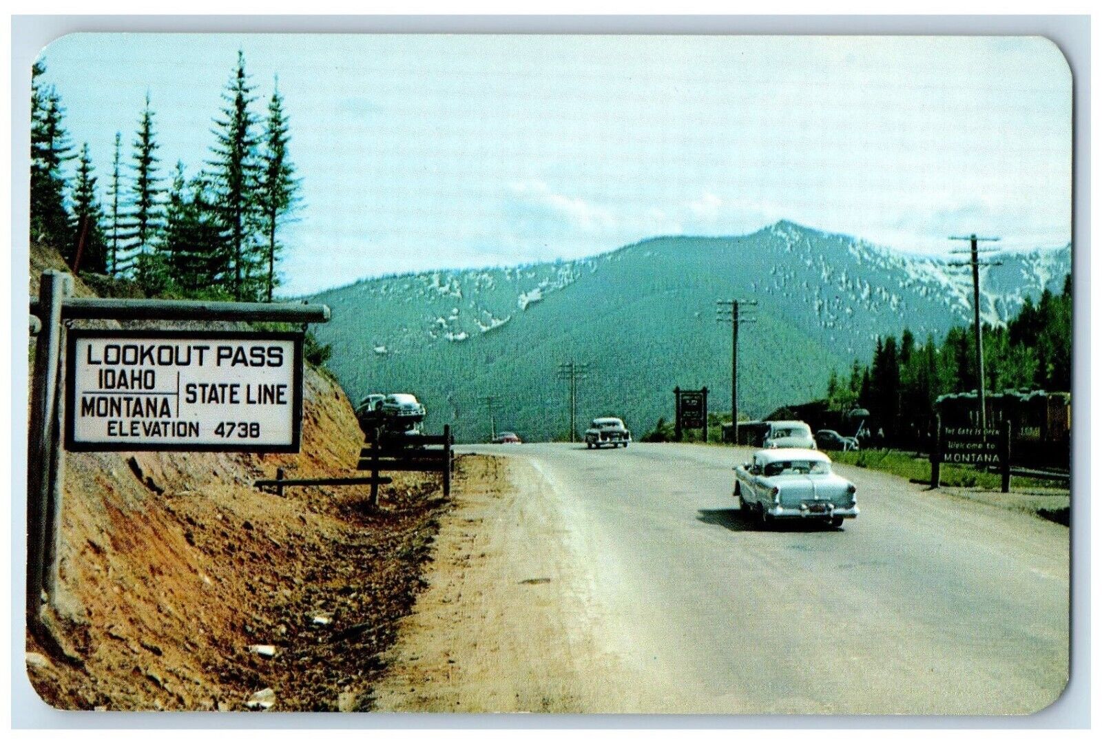 Lookout Pass Idaho Postcard Tourist Traffic Bitterroof Mountains c1960 Vintage