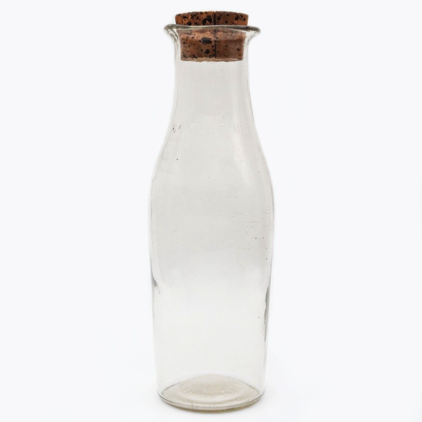 Antique \'64 Fluid Oz.\' Patented 1896 Embossed Flared Lip Tall Clear Glass Bottle