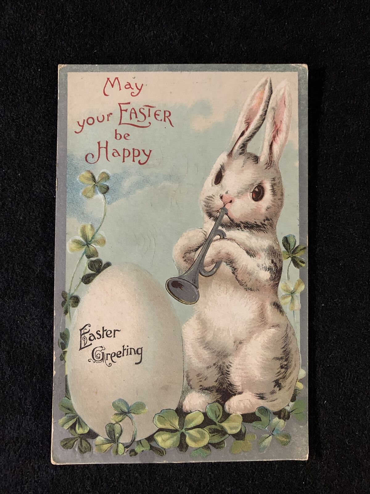 c1910's Easter Greeting Egg Bunny Trumpet Embossed Antique Postcard Unposted