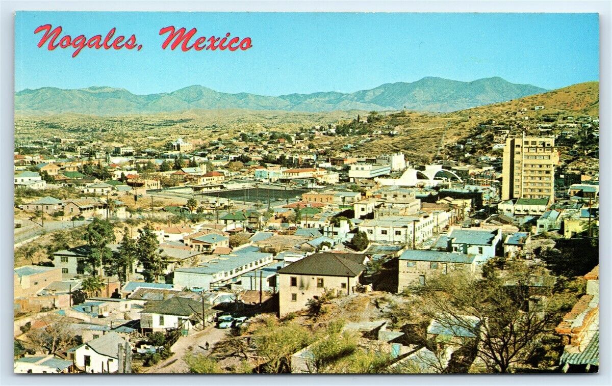 Postcard Semi-Aerial view of Nogales, Mexico & Arizona G111