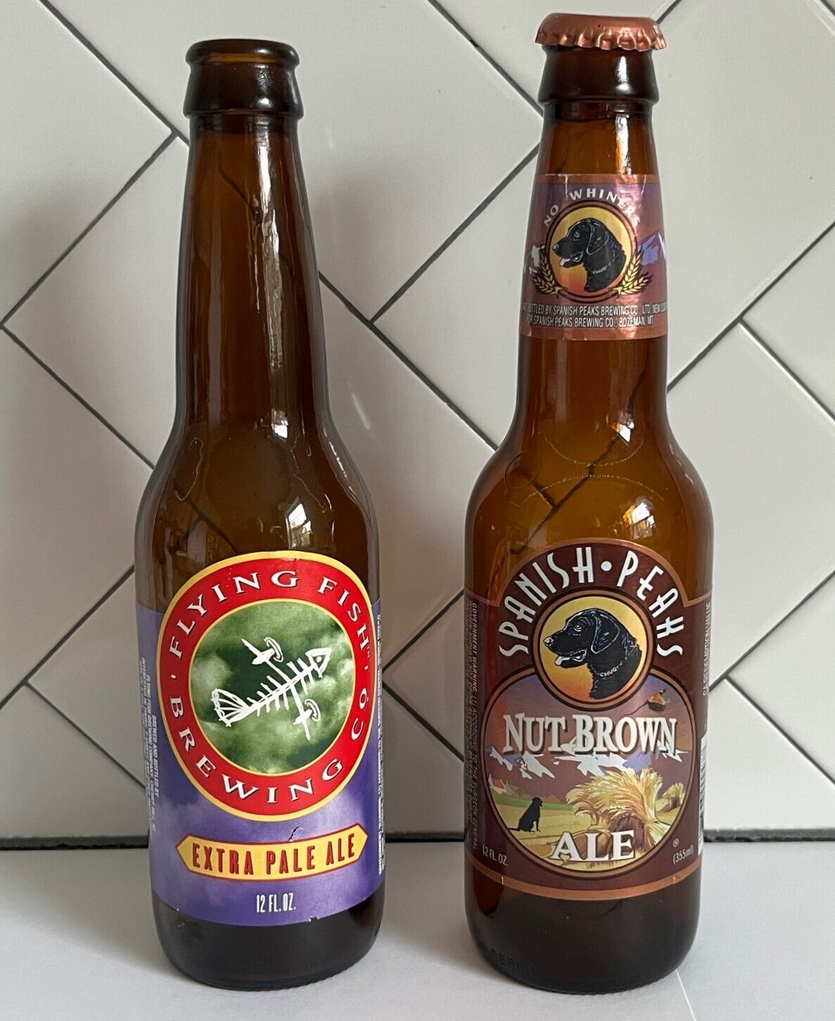 2 beer bottles Spanish Peaks Nut Brown Ale and Flying Fish Extra Pale Ale