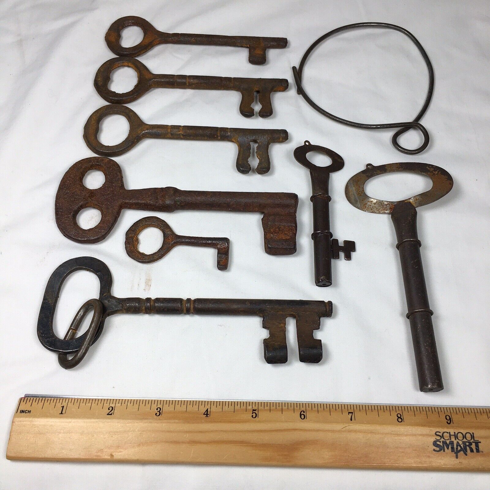 Lot of 6 Antique Vintage Cast Iron Skeleton Keys and 2 Hollow Barrel on Old Ring