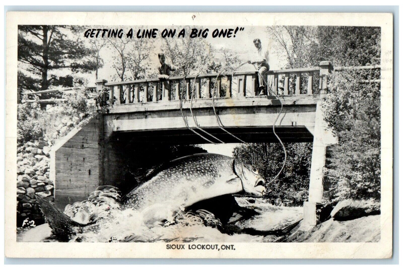 1959 Man Cached Exaggerated Fish Sioux Lookout Ontario RPPC Photo Postcard