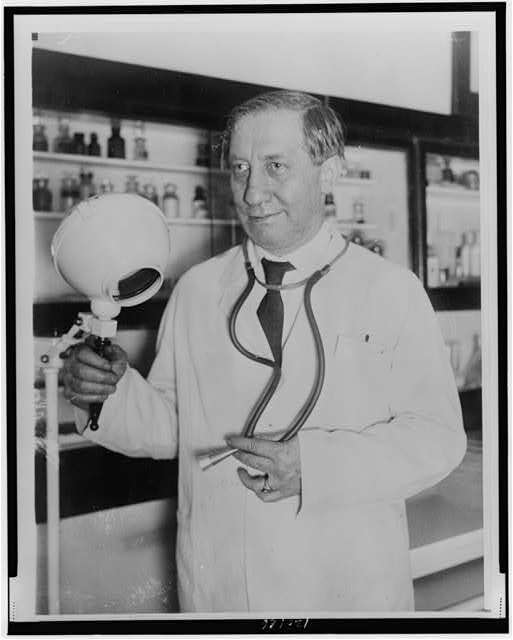 Dr. Frederick Albert Cook,in a laboratory,1865-1940,American explorer,physician