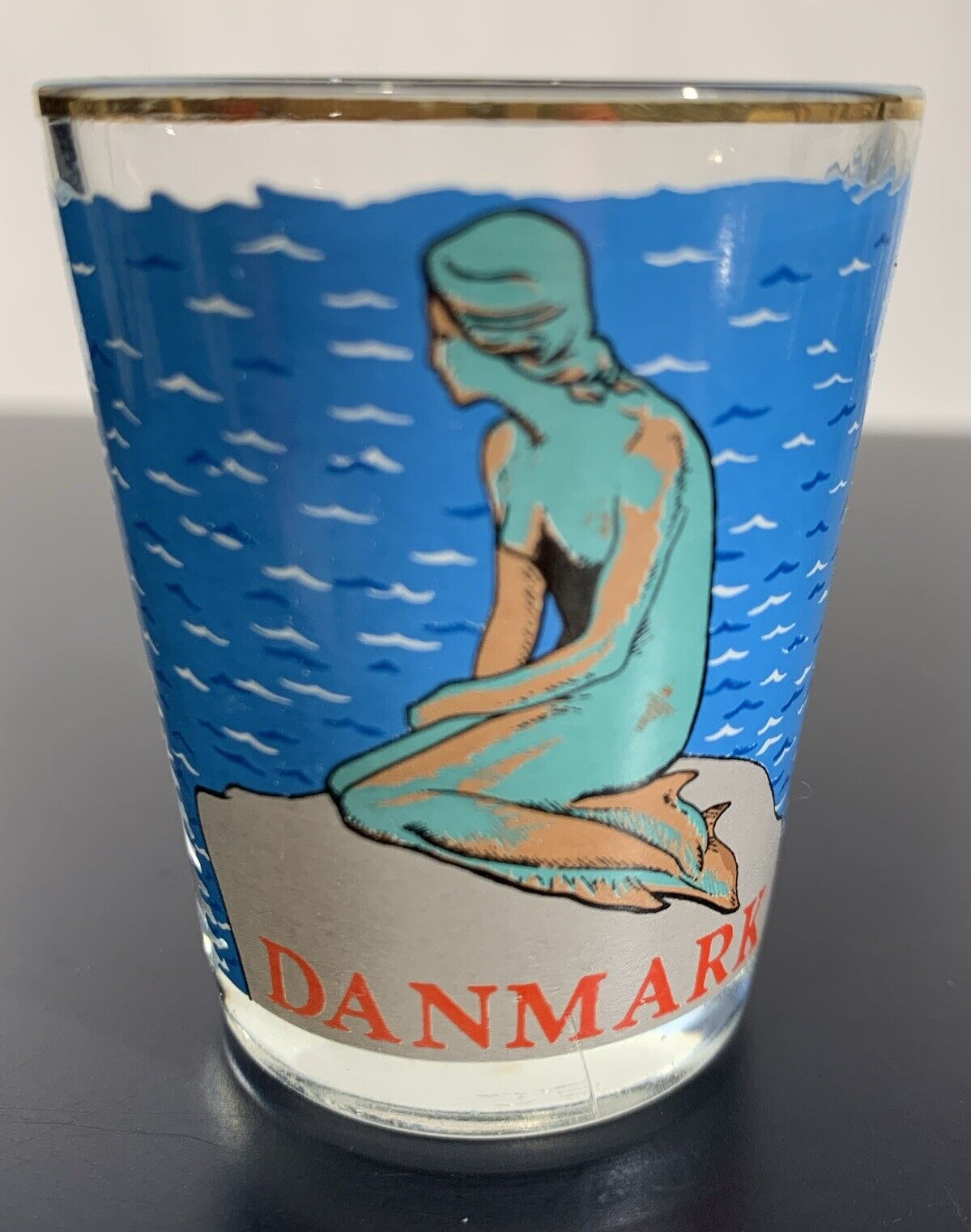 VTG Danmark Shot Glass Souvenir Mermaid Gold Trim Waves Beach Blue Rock MCM