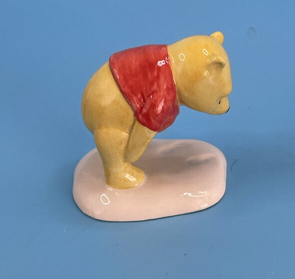 Royal Doulton Figurine Winnie the Pooh and the paw marks  EUC