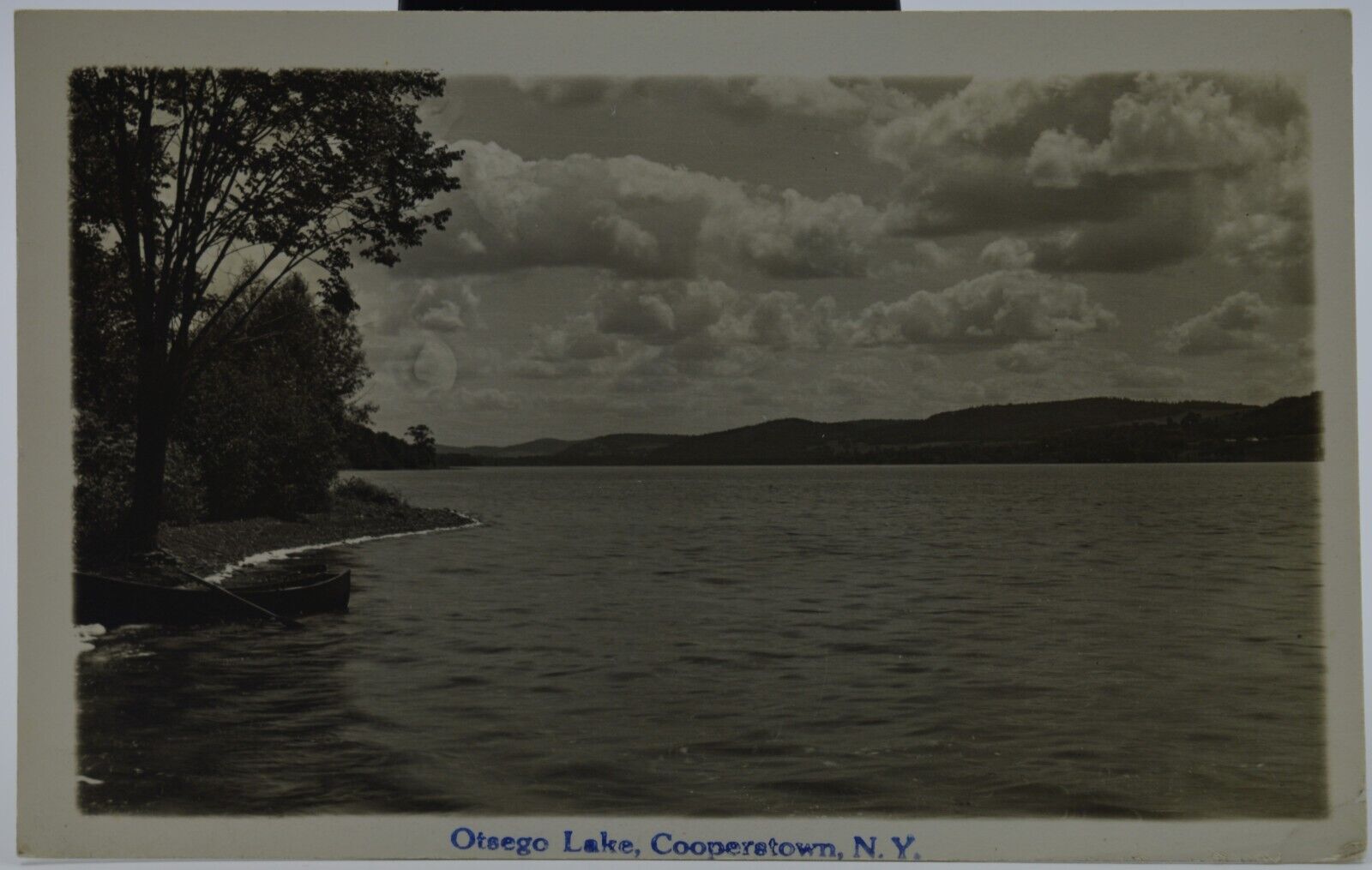 1937 - RPPC, Real Photo Postcard, Otsego Lake, Cooperstown, NY - Canoe on Beach