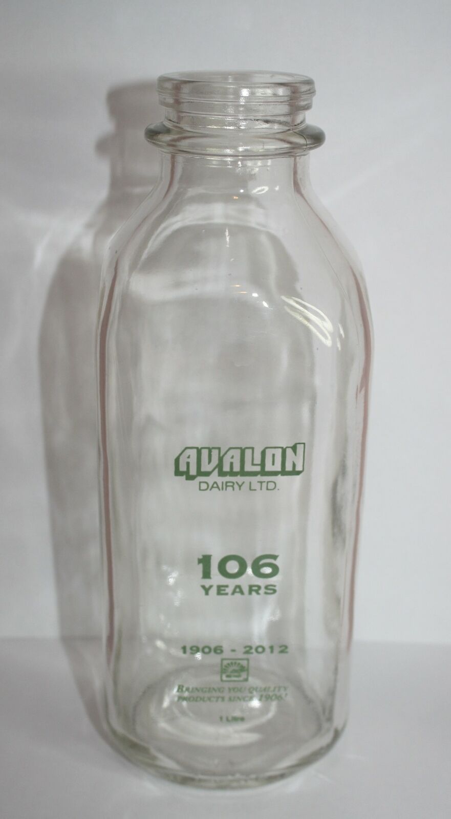 VINTAGE AVALON DAIRY LTD. MILK BOTTLE 106 YEARS 1906-2012 GREEN ACL 1 LITRE