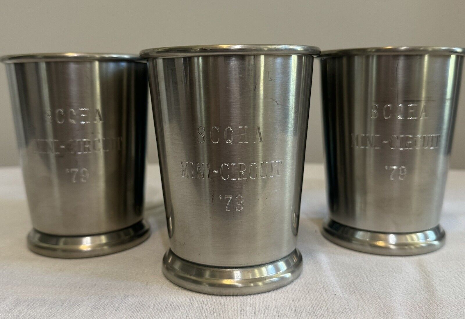 SET OF 4 PEWTER CUPS WITH ENGRAVING FROM HORSE SHOWS CIRCA 70s