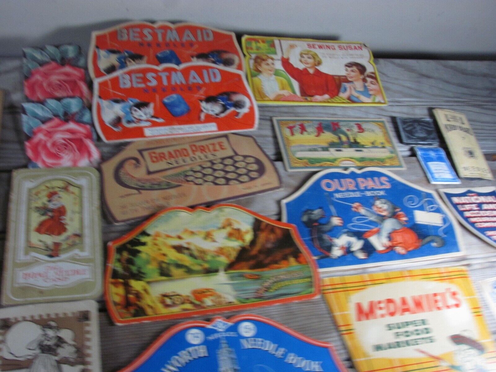 Vintage Sewing Needle Book Lot of 19 Advertising Graphics cats ladies skyscraper