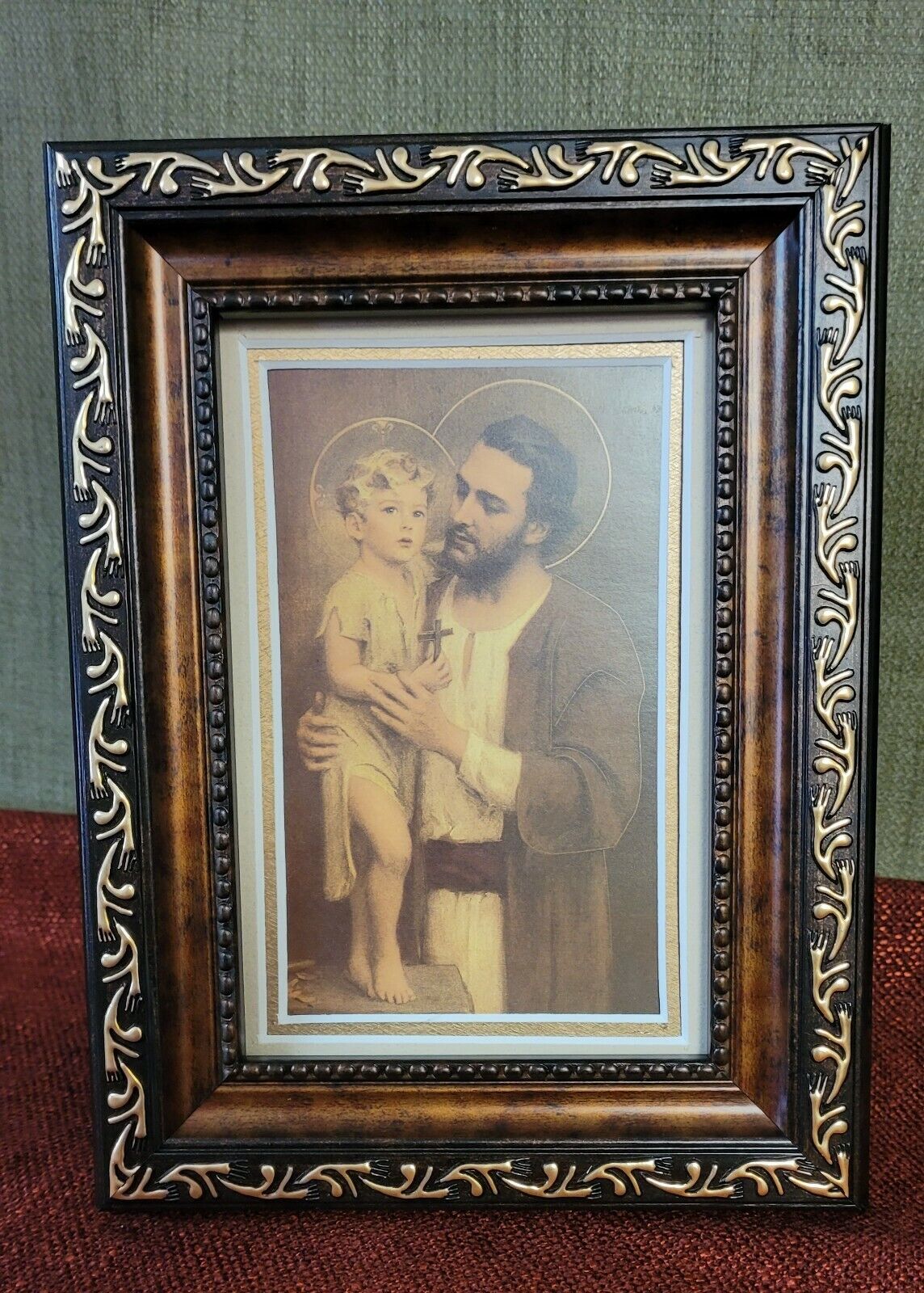 Saint Joseph and child Jesus framed desktop pic