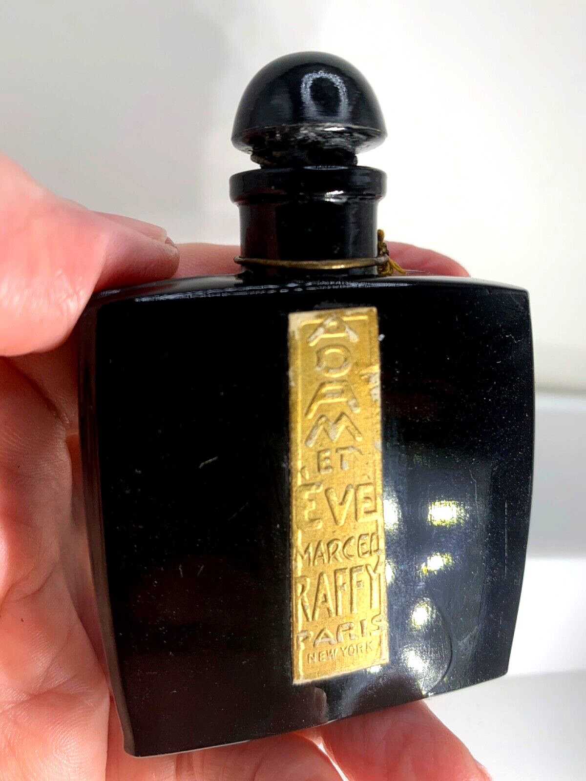 Rare  Antique black glass perfume bottle.  Adam Et Eve by Raffy.  1923.  3.25”T