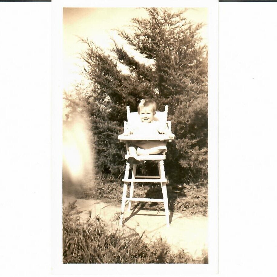 1950 Photo Cute Child Girl Wooden Highchair Vintage Old Outside on Sidewalk