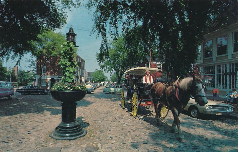 Horse and Carriage on Cobblestone Streets Village of Nantucket MA Massachusetts