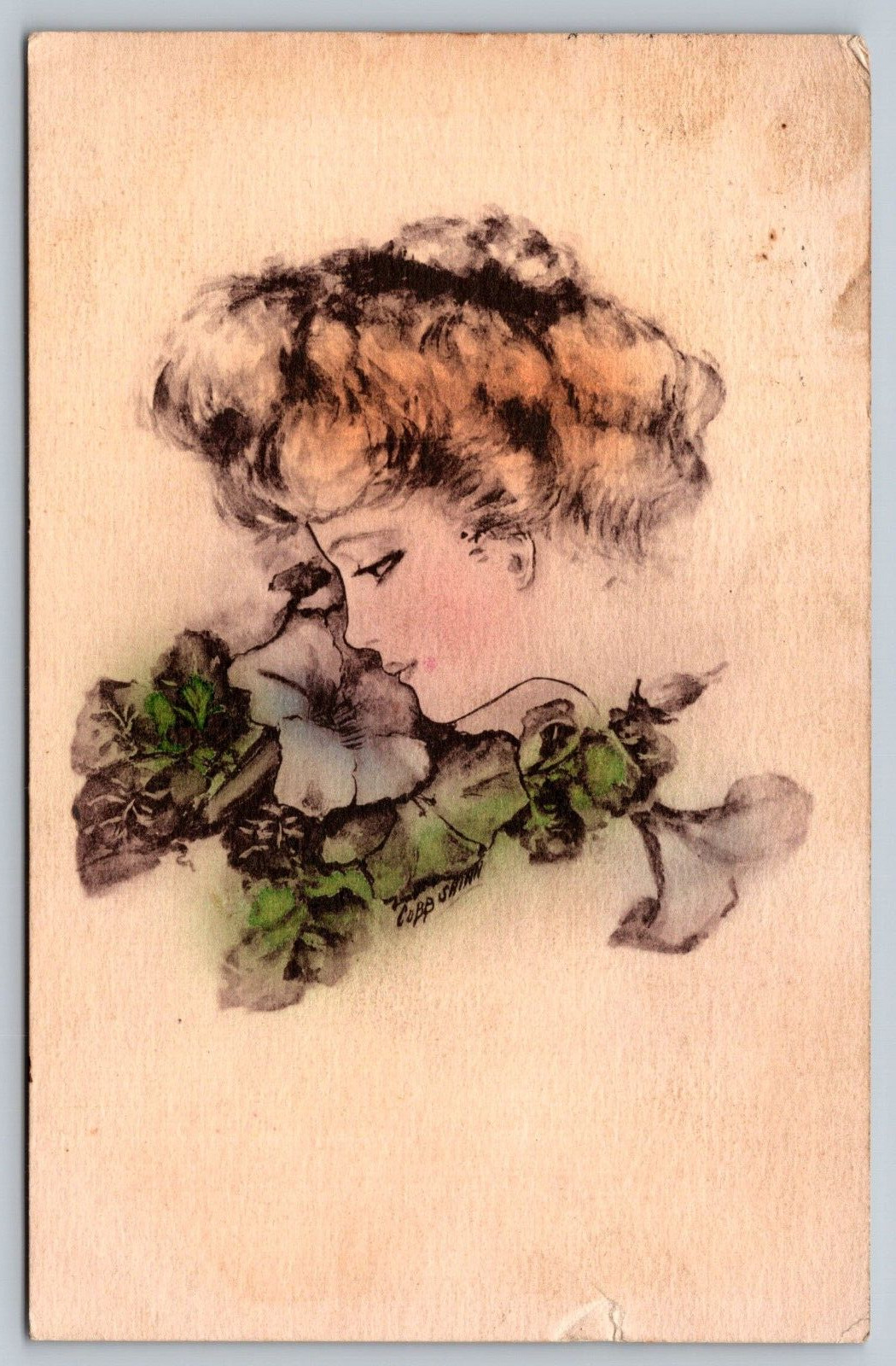 Woman Smelling flower Colored Cobb Shin artist signed art nouveau vtg postcard 