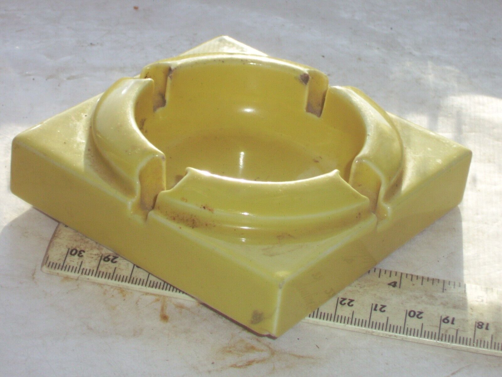Rare yellow glazed Art Deco ashtray, with small nick on corner base