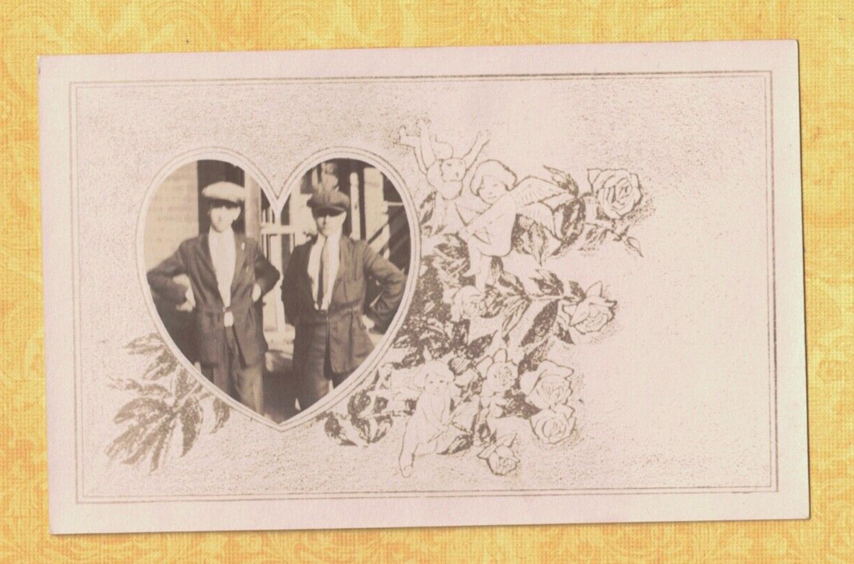 X RPPC real photo postcard 1908-29 TWO TEENAGE BOYS INSIDE A HEART SHAPE 