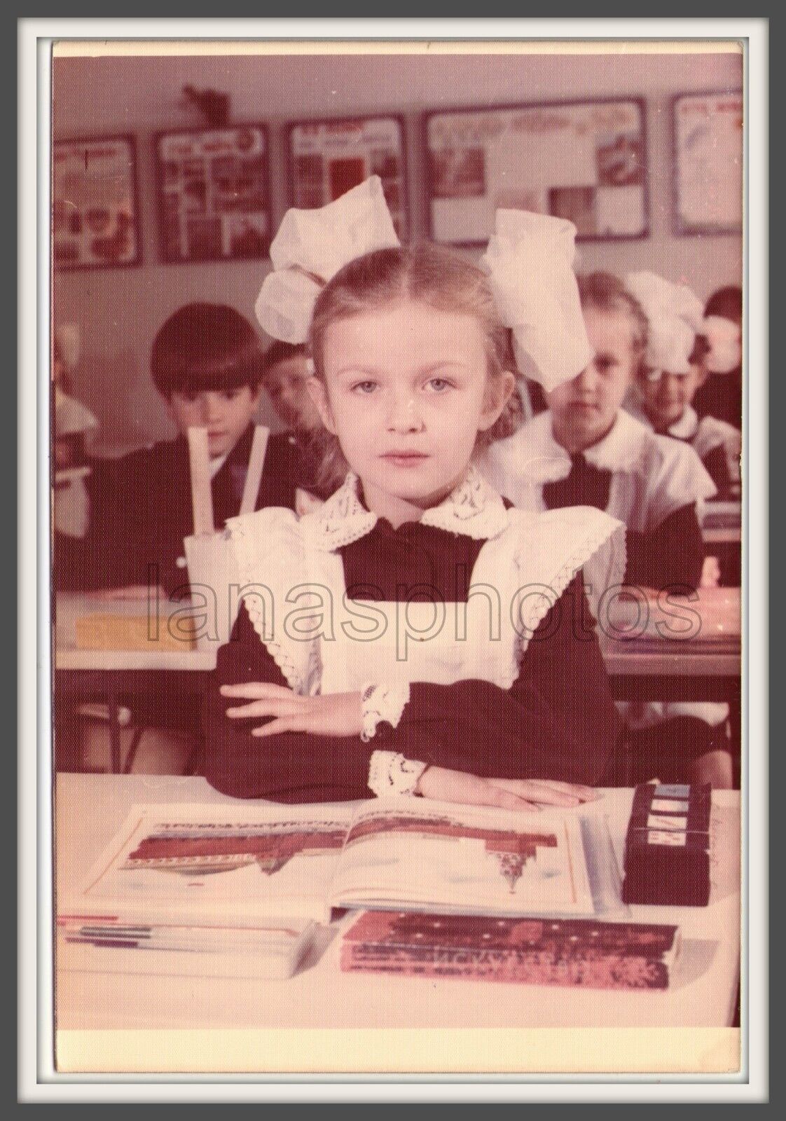 Beautiful young girl School uniform Book Long hair Braid Big bow USSR life photo