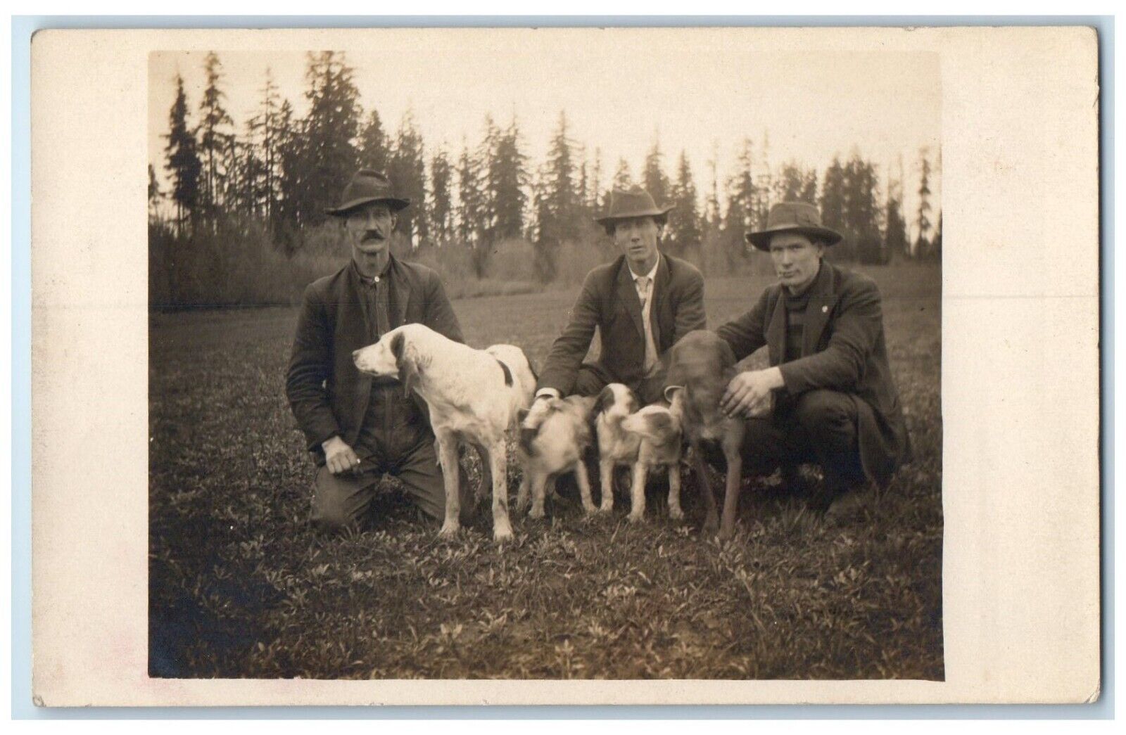c1910\'s Mens With Dog And Puppies Scene Field Hunting RPPC Photo Postcard
